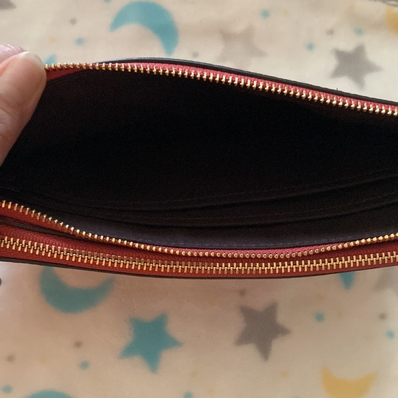 Coach pink wristlet. Never used. Great condition. - Picture 6 of 6